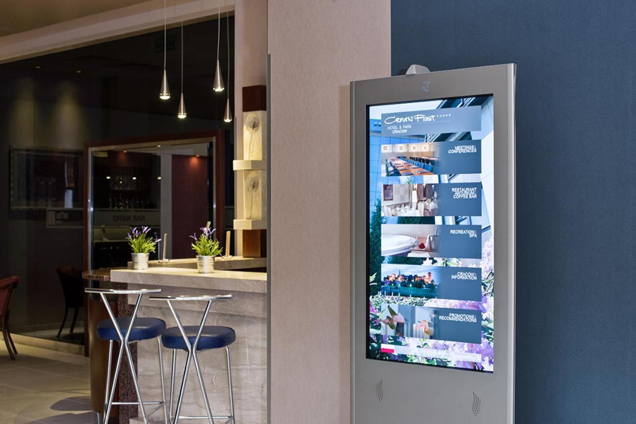 Booking Hotel & Spa Krakow Dış mekan fotoğraf A digital signage display